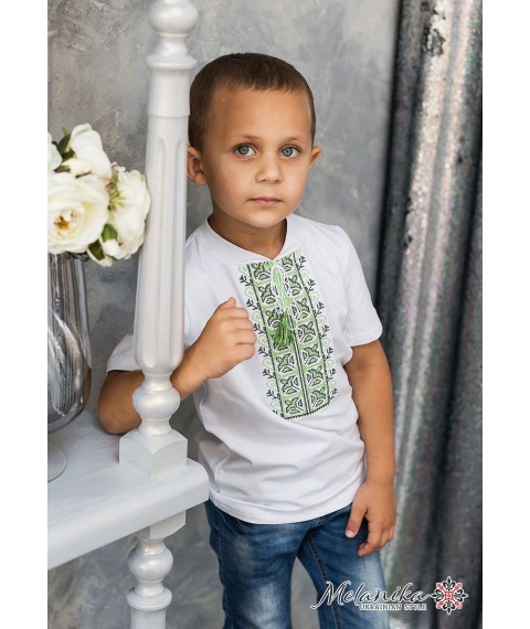 Fashionable embroidery for a boy in white with a green ornament "Dem'yanchik"