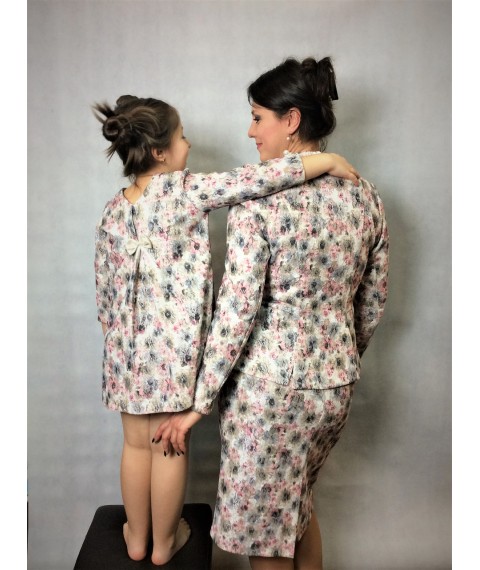 Suit for mother and dress for daughter made from the same materials