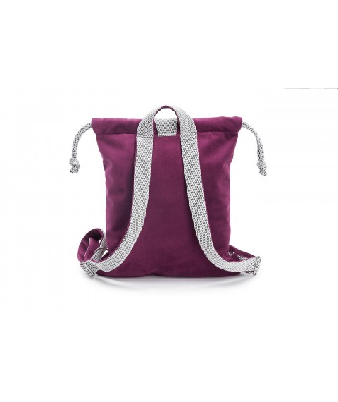 The backpack is female, the color is dark purple